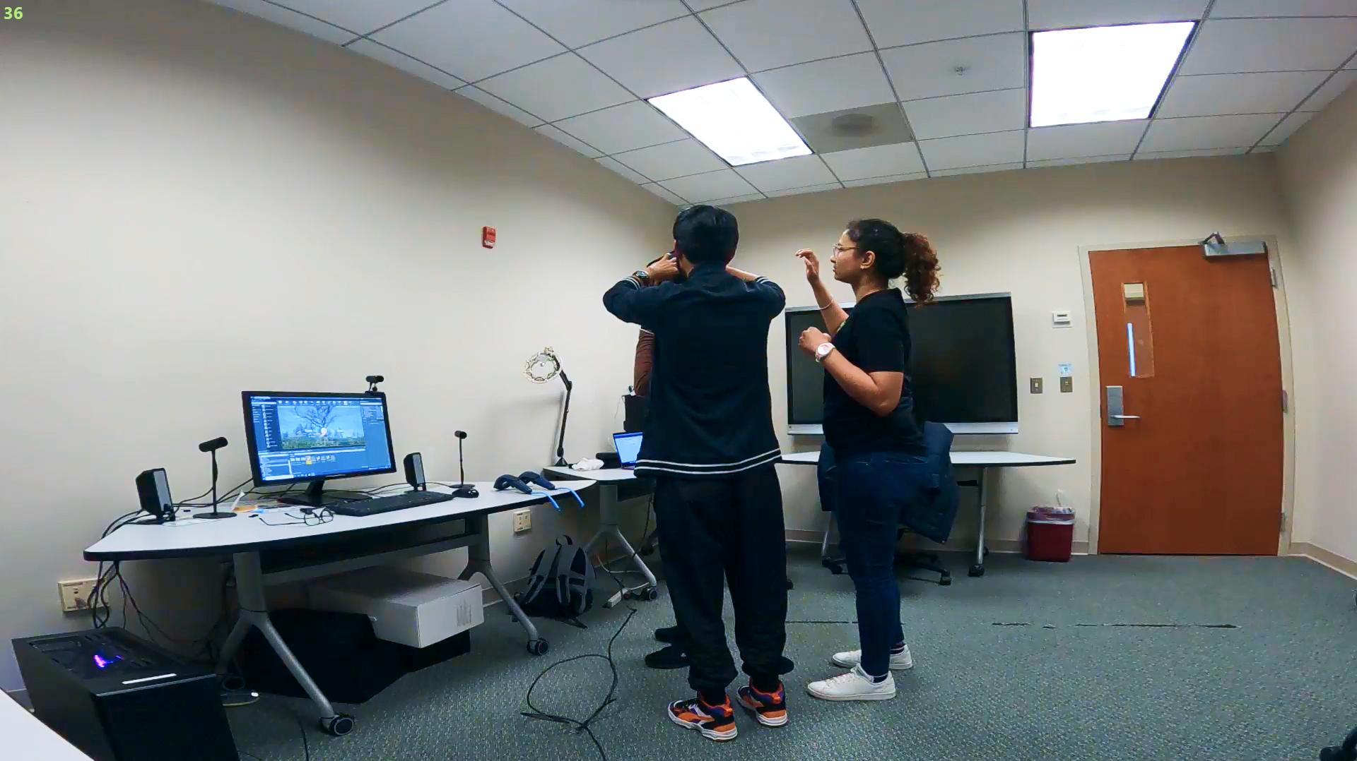 VR Headset being put on subject
